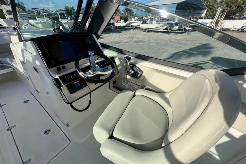 Slide: The Image of Interior view of 2025 Boston Whaler 240 Vantage cockpit. - 15