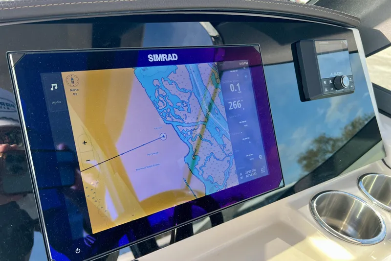 Slide: The Image of Simrad navigation system on 2025 Boston Whaler 240 Vantage boat. - 18