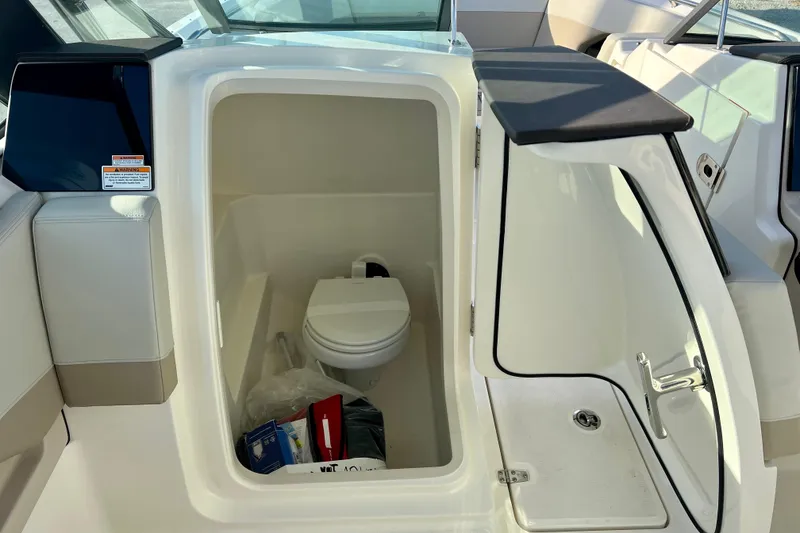 Slide: The Image of Interior of 2025 Boston Whaler 240 Vantage featuring a toilet. - 20