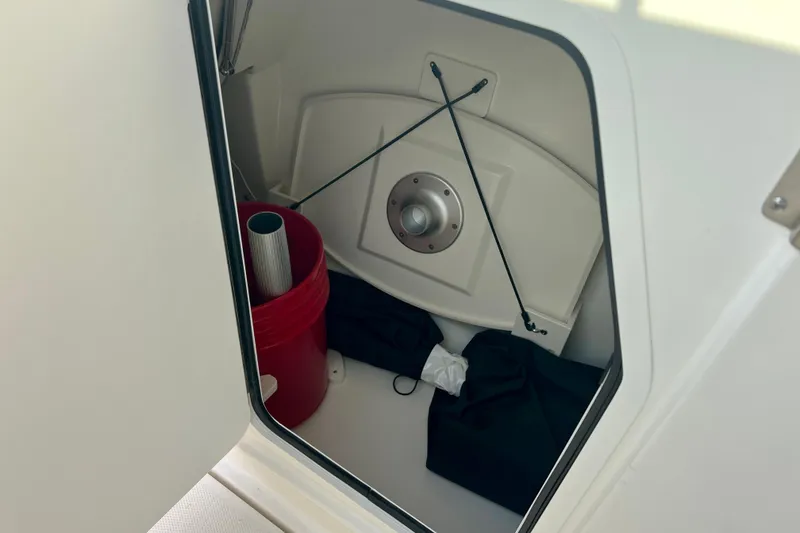 Slide: The Image of Storage compartment in Boston Whaler 240 Vantage 2025 boat. - 23