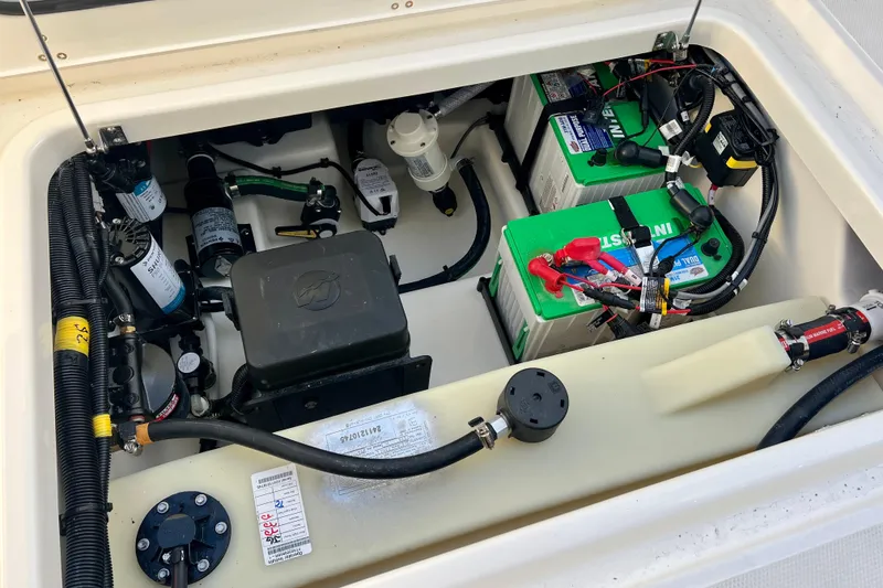 Slide: The Image of 2025 Boston Whaler 240 Vantage electrical system with batteries and wiring. - 32