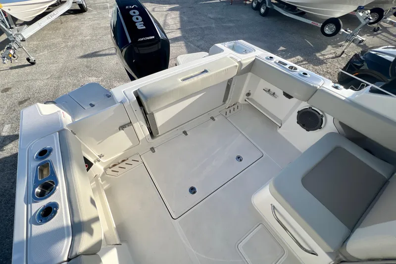 Slide: The Image of Interior of 2025 Boston Whaler 240 Vantage with seating and storage. - 9