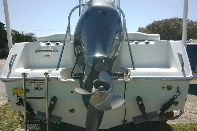 Slide: The Image of 2015 Sea Hunt Ultra 225 boat with outboard motor, rear view. - 11