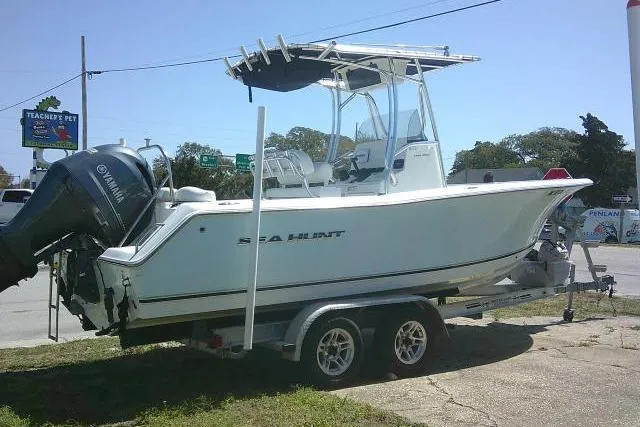 Slide: The Image of 2015 Sea Hunt Ultra 225 boat on trailer with Yamaha outboard motor. - 8
