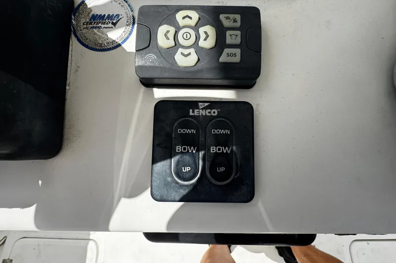Slide: The Image of Control panel on a 2008 Sea Fox 287 CC boat with Lenco trim tab switches. - 15