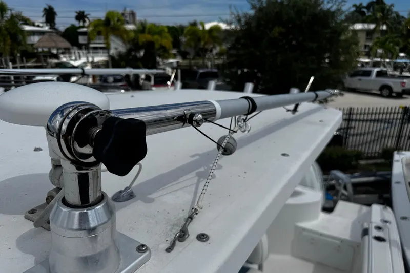 Slide: The Image of Close-up of a 2008 Sea Fox 287 CC boat's fishing rod holder on deck. - 25