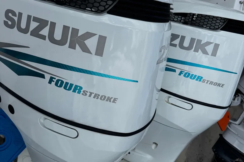 Slide: The Image of Twin Suzuki four-stroke outboard engines on a 2008 Sea Fox 287 CC boat. - 28