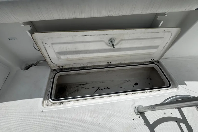 Slide: The Image of Open storage compartment on 2008 Sea Fox 287 CC boat deck. - 7