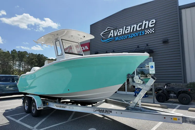 The Image of 2026 Sea Fox 228 Commander boat on trailer at Avalanche Motorsports dealership. - 0