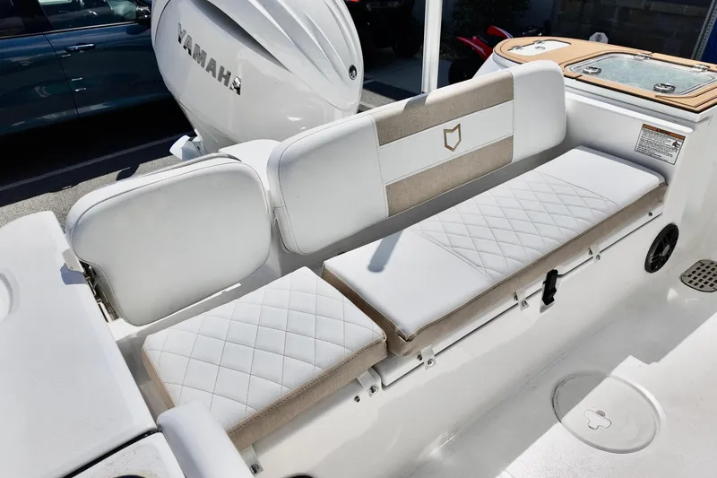 Slide: The Image of 2026 Sea Fox 228 Commander boat interior with Yamaha engine and cushioned seating. - 12