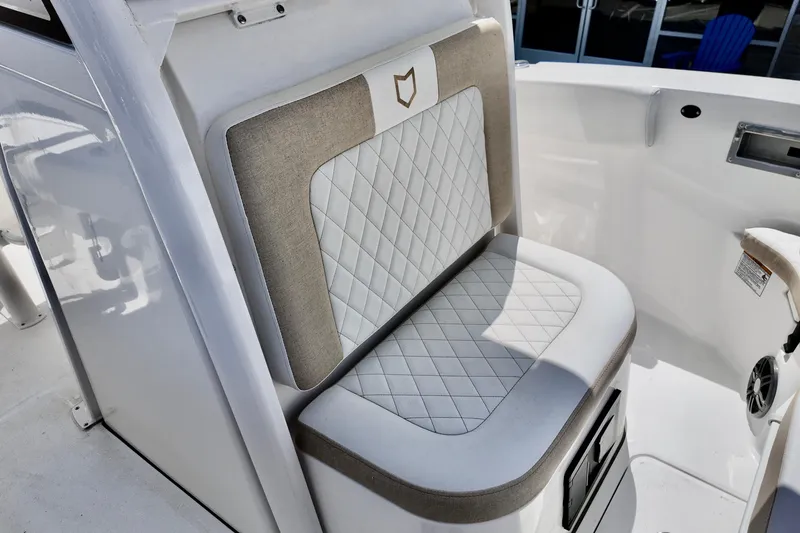 Slide: The Image of 2026 Sea Fox 228 Commander boat seat with quilted upholstery and storage compartment. - 6