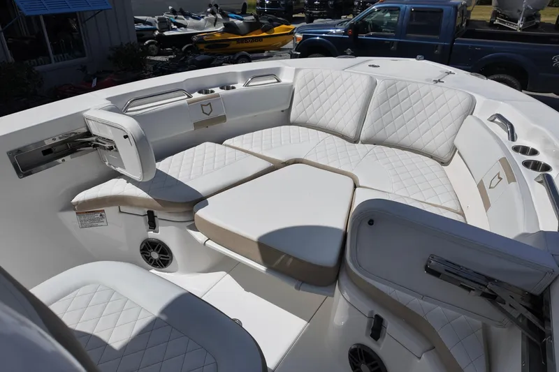 Slide: The Image of Luxurious seating area on 2026 Sea Fox 228 Commander boat with white quilted upholstery. - 7