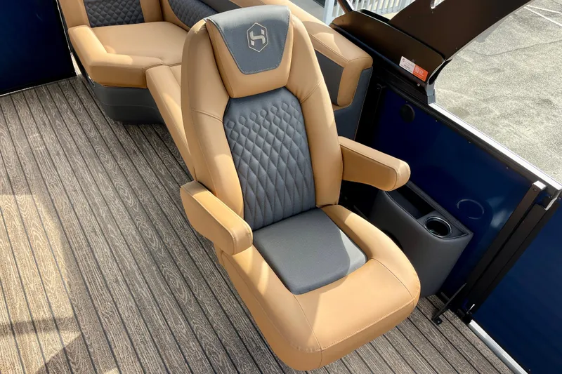 Slide: The Image of Luxurious seating in Harris Sunliner 250 pontoon boat, model 2026. - 12