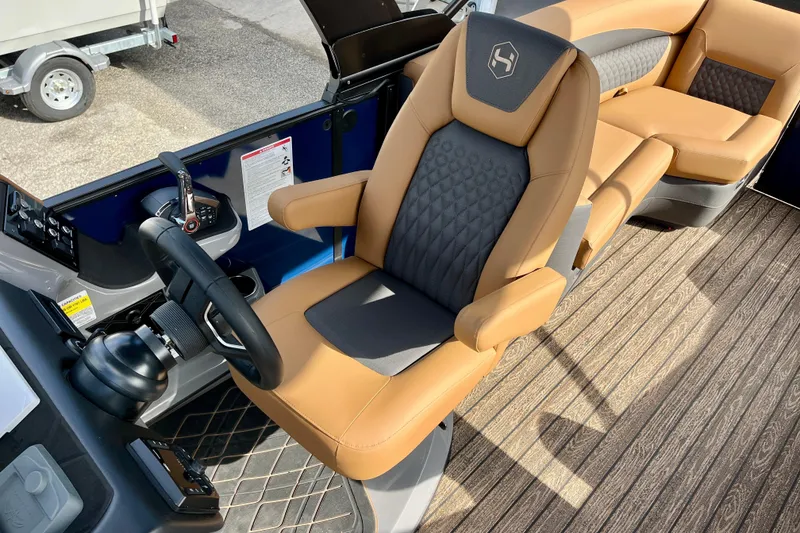 Slide: The Image of Interior of Harris Sunliner 250 boat, luxurious seating, model year 2026. - 13