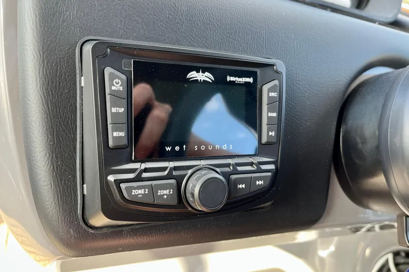 Slide: The Image of Harris Sunliner 250 2026 control panel with Wet Sounds display. - 16