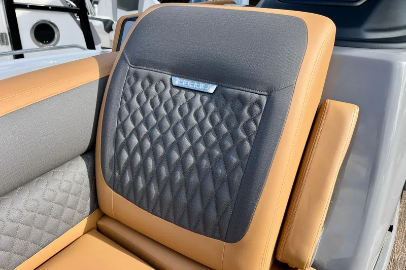 Slide: The Image of Luxurious seat of 2026 Harris Sunliner 250 with quilted design. - 35