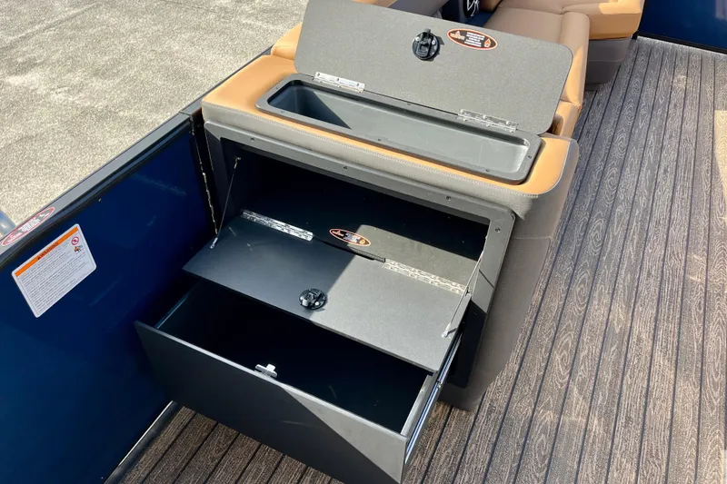 Slide: The Image of Harris Sunliner 250 2026 with open storage compartment and seating area. - 37