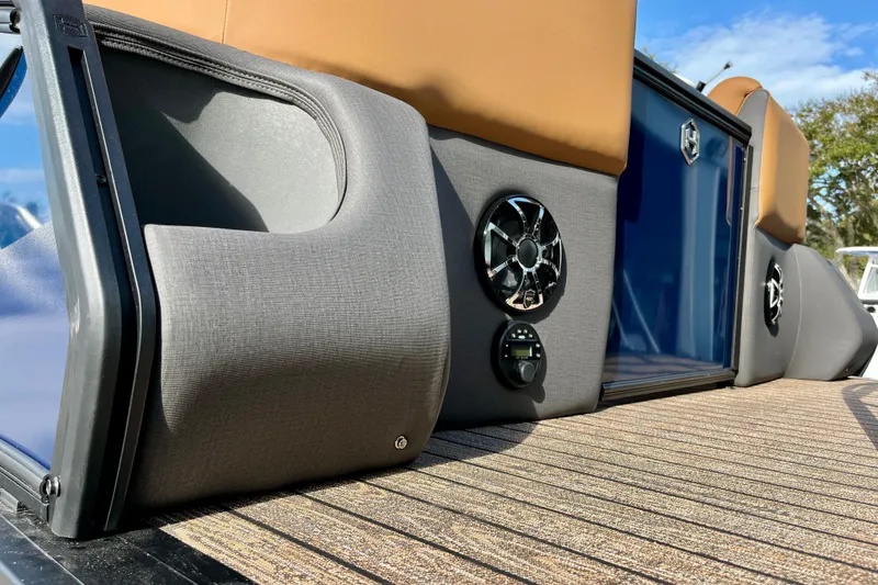 Slide: The Image of Harris Sunliner 250 2026 boat interior with speakers. - 39