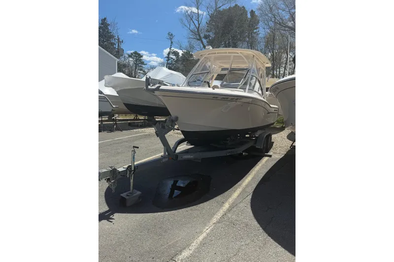 The Image of 2019 Grady-White Freedom 235 boat on trailer outdoors. - 0