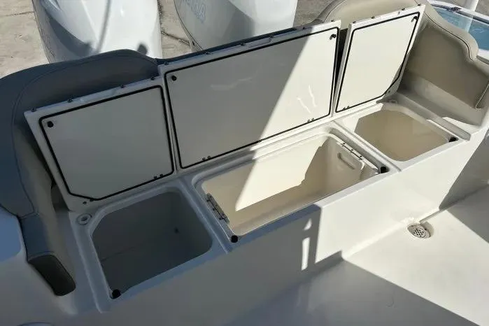 Slide: The Image of 2023 Key West 263 FS boat storage compartments, open and spacious for gear organization. - 16