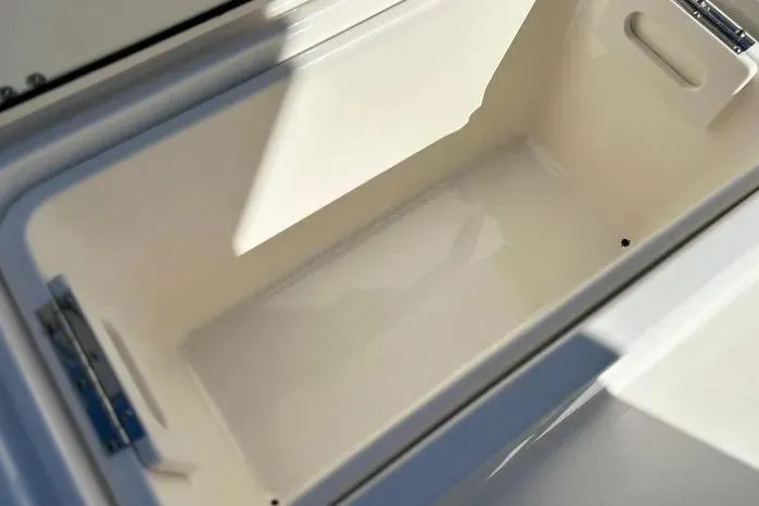 Slide: The Image of Open storage compartment on 2023 Key West 263 FS boat, showcasing interior space. - 17