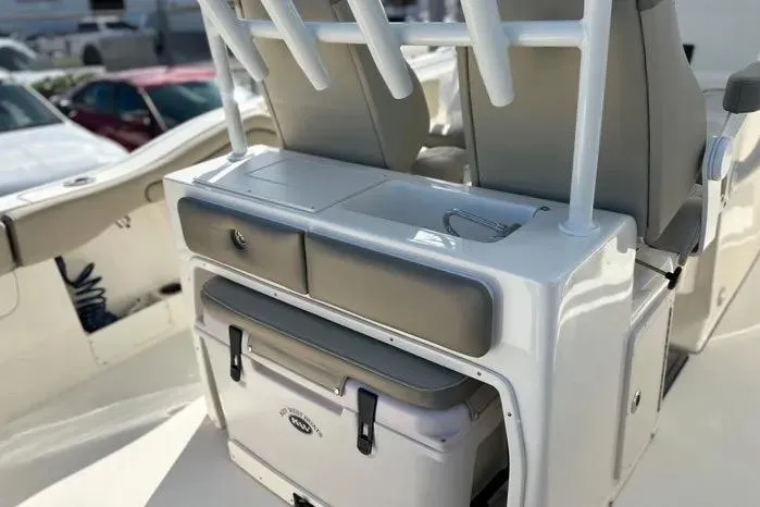 Slide: The Image of 2023 Key West 263 FS boat interior with storage and seating area. - 29
