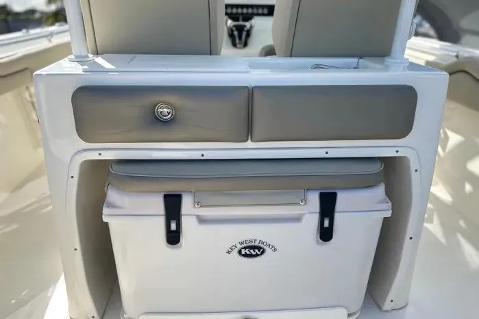 Slide: The Image of 2023 Key West 263 FS boat interior with storage and cooler. - 30