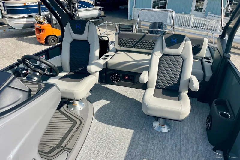 Slide: The Image of Interior of 2026 Harris Sunliner 230 Sport with luxurious seating. - 11