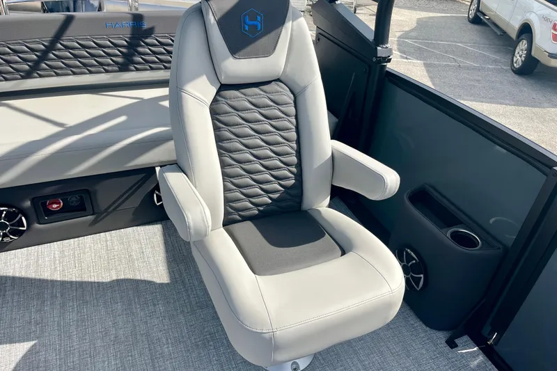 Slide: The Image of Luxurious seating in Harris Sunliner 230 Sport 2026 boat. - 12