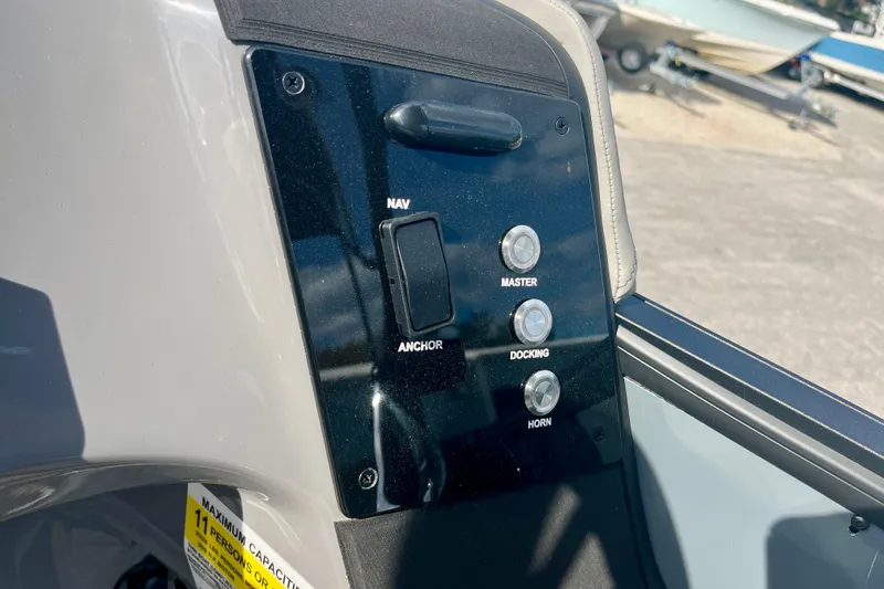 Slide: The Image of Control panel of Harris Sunliner 230 Sport 2026 with switches. - 18