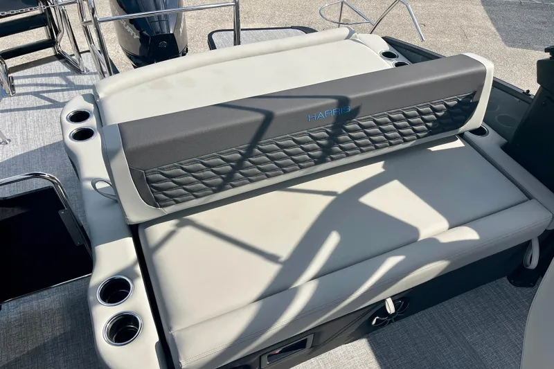 Slide: The Image of Harris Sunliner 230 Sport 2026, luxurious boat seating with cup holders. - 21