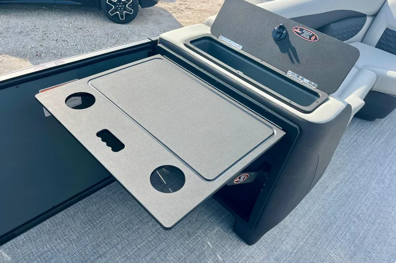 Slide: The Image of Harris Sunliner 230 Sport 2026 with integrated table and cup holders. - 26