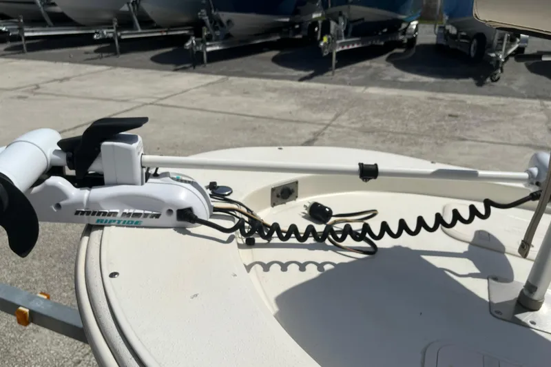 Slide: The Image of 2015 Carolina Skiff JV15CC with Minn Kota Riptide trolling motor on deck. - 19