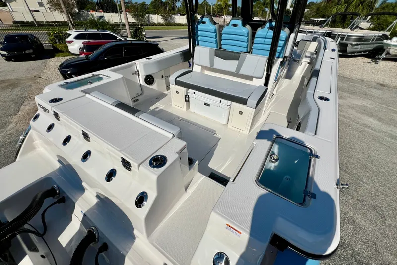 Slide: The Image of 2026 Robalo R300 Center Console boat interior with seating and storage compartments. - 10