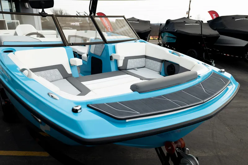 Slide: The Image of 2023 Heyday H22 boat with blue exterior and spacious seating area. - 10