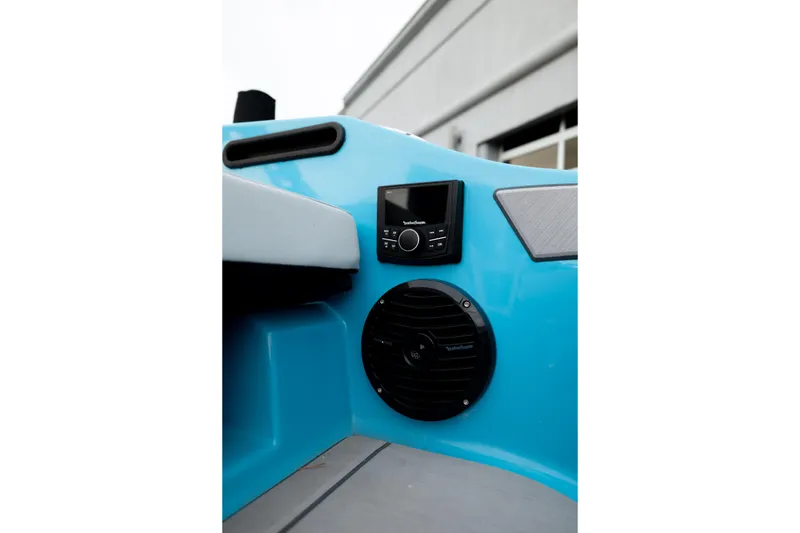 Slide: The Image of 2023 Heyday H22 boat interior with audio system and speaker. - 13