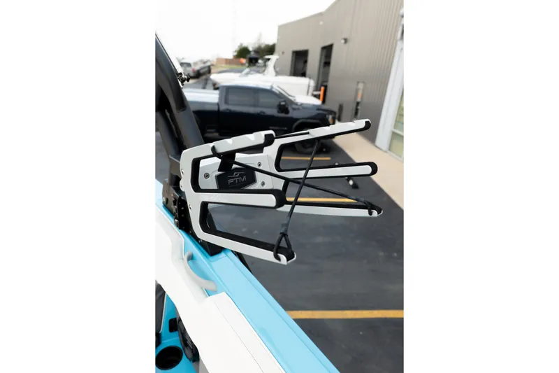 Slide: The Image of 2023 Heyday H22 boat with PTM accessory, parked near a building. - 19