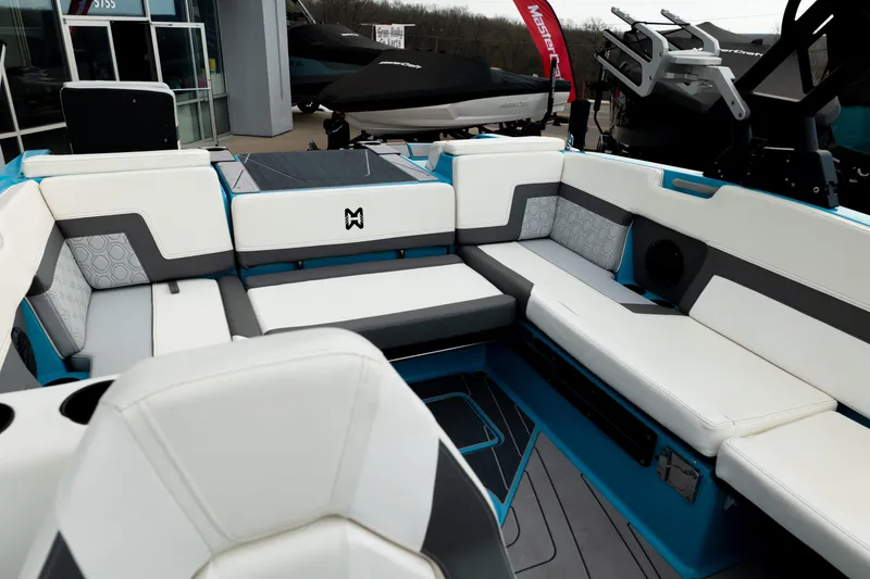 Slide: The Image of 2023 Heyday H22 boat interior with white and gray seating, modern design. - 23