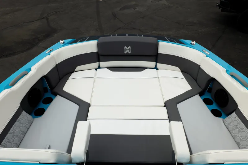 Slide: The Image of 2023 Heyday H22 boat interior with white and gray cushioned seating. - 30