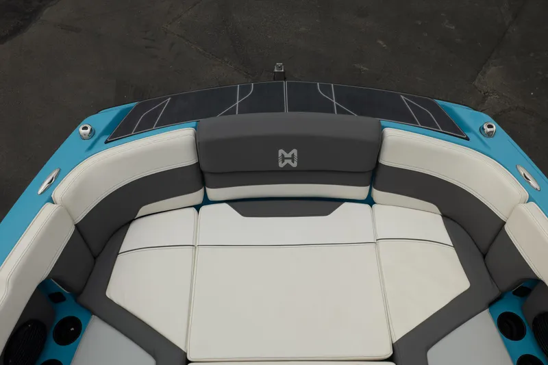 Slide: The Image of 2023 Heyday H22 boat interior with gray and white seating, blue accents. - 31