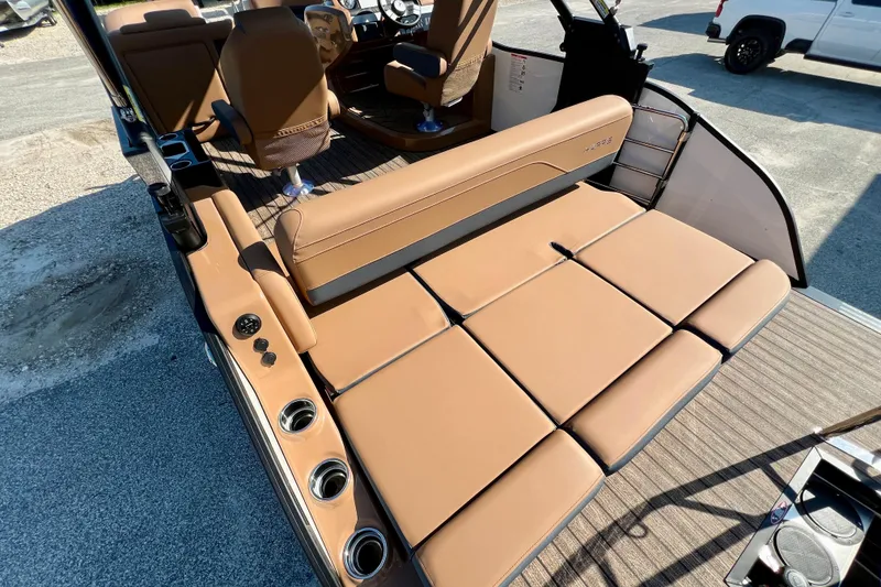 Slide: The Image of Interior of 2026 Harris Grand Mariner 230 with luxurious leather seating. - 18