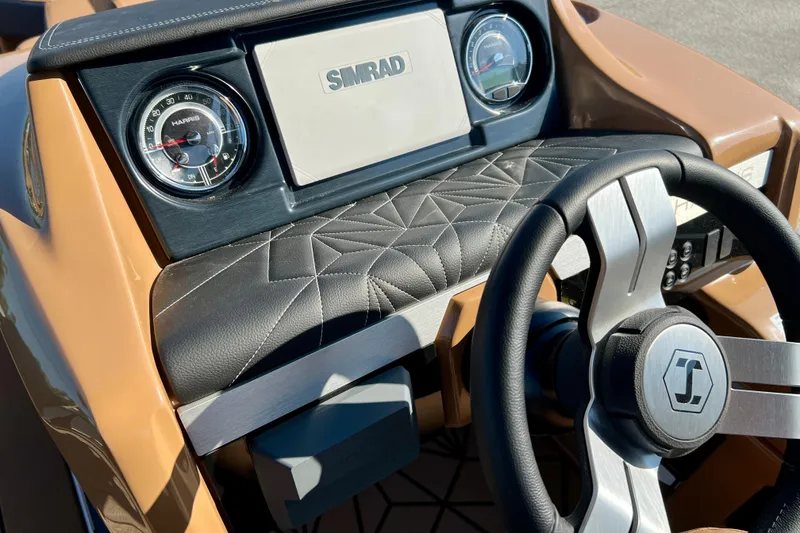 Slide: The Image of Dashboard of 2026 Harris Grand Mariner 230 with steering wheel and gauges. - 20