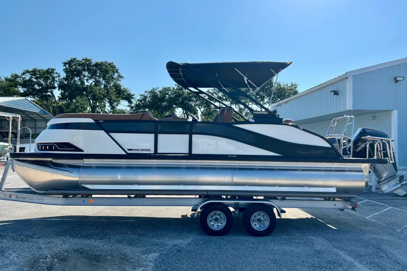 Slide: The Image of 2026 Harris Grand Mariner 230 pontoon boat on trailer. - 5
