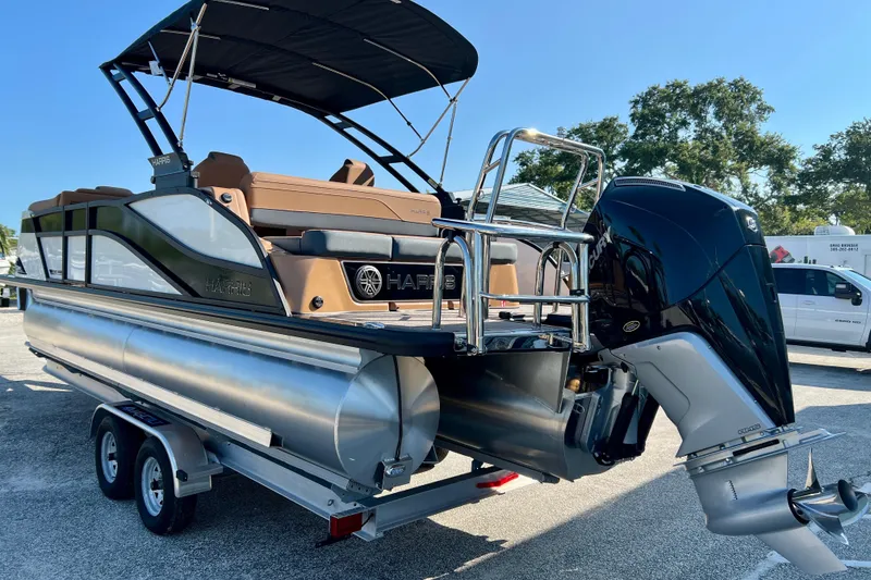 Slide: The Image of 2026 Harris Grand Mariner 230 pontoon boat on trailer. - 6