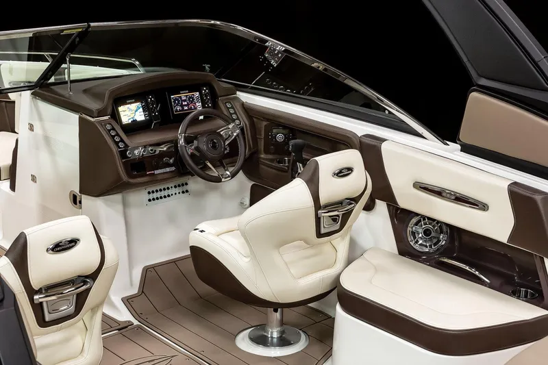 Slide: The Image of Manufacturer Provided Image: 2021 Chaparral 267 SSX boat interior with modern dashboard and luxurious seating. - 8