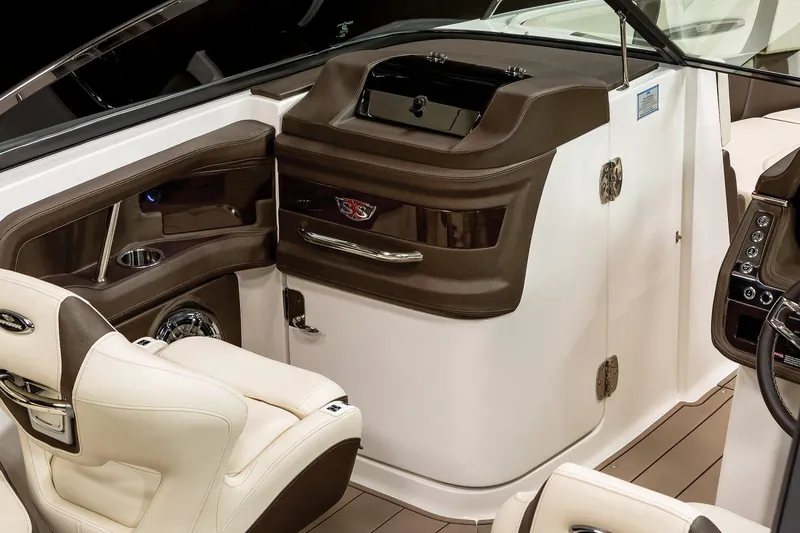 Slide: The Image of Manufacturer Provided Image: 2021 Chaparral 267 SSX boat interior with luxurious seating and modern dashboard. - 9