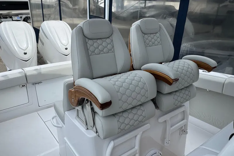 Slide: The Image of Luxury seating on a 2026 Jupiter 30 boat, featuring elegant design and premium materials. - 31