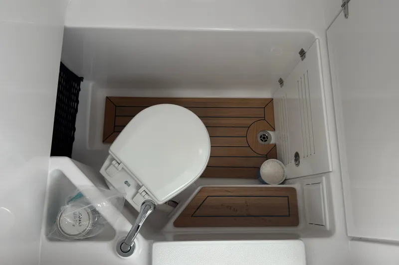 Slide: The Image of Compact marine bathroom with toilet and wooden flooring, Jupiter 30 model, 2026. - 41
