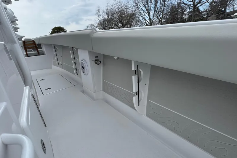 Slide: The Image of 2026 Jupiter 30 boat interior with sleek white design and modern features. - 45