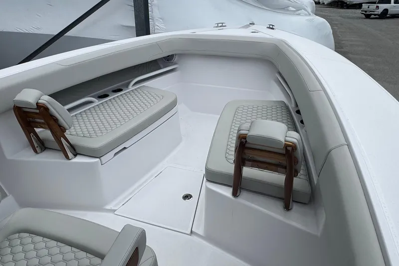 Slide: The Image of Luxurious seating area on a 2026 Jupiter 30 boat with elegant upholstery. - 50